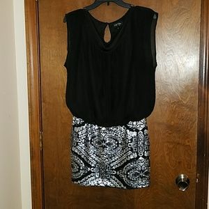 Black dress with gray and silver sequin detail.